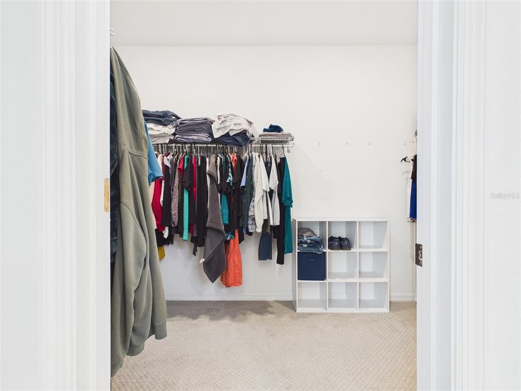 6224 Southwest 74th Ter Road Ocala, FL 34474 - Photo 35 of 52 a view of walk in closet with clothes