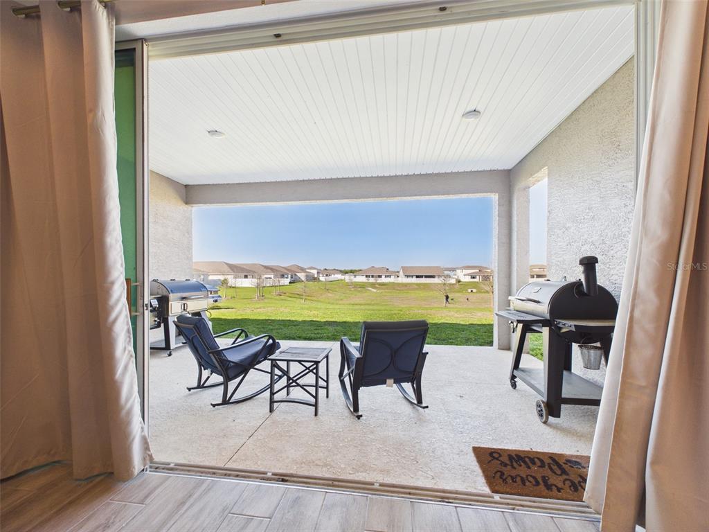 6224 Southwest 74th Ter Road Ocala, FL 34474 - Photo 49 of 52 a view of a dining room with furniture and a window