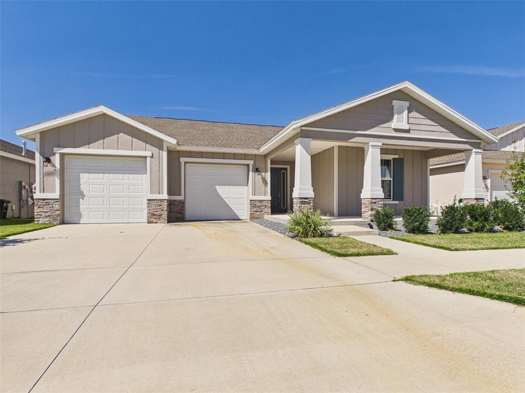 6224 Southwest 74th Ter Road Ocala, FL 34474 - Photo 6 of 52 a front view of a house with a yard