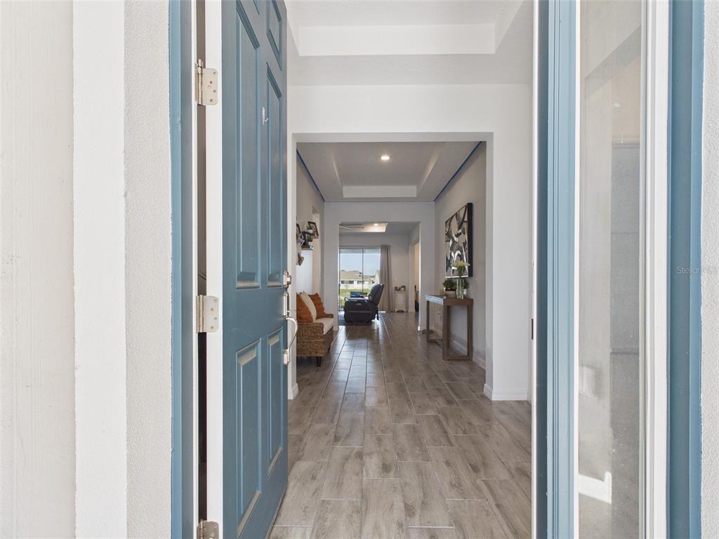 6224 Southwest 74th Ter Road Ocala, FL 34474 - Photo 10 of 52 a view of a livingroom from a hallway