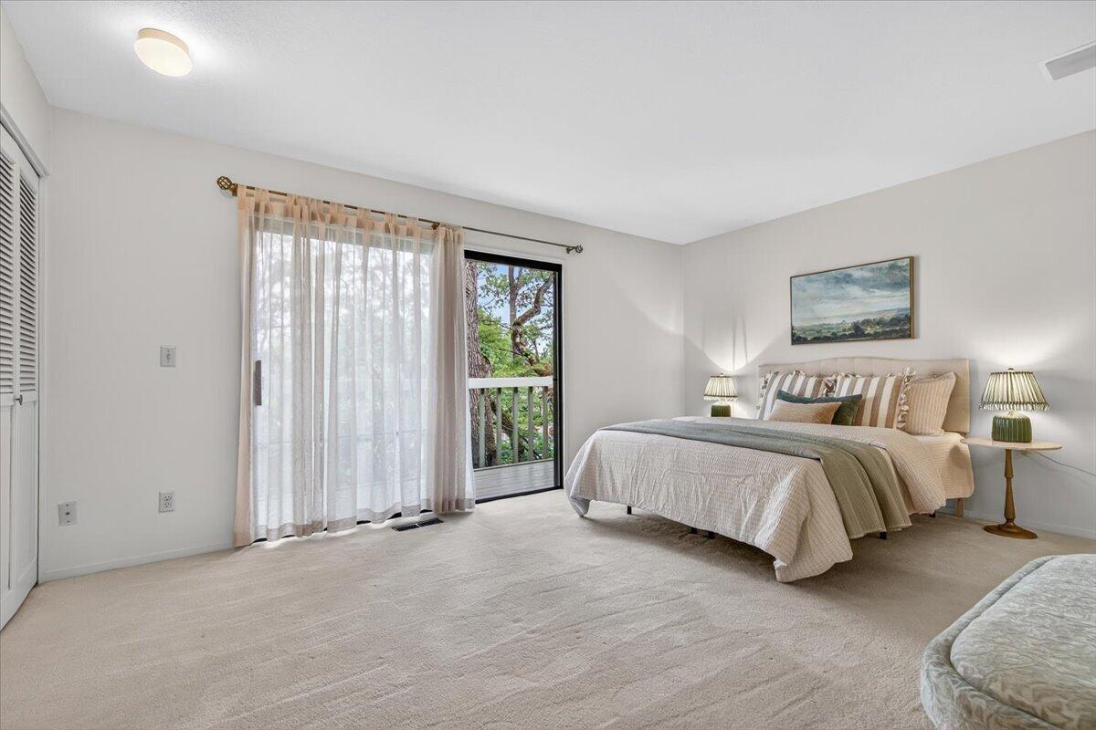 2647 Freedom Way Medford, OR 97504 - Photo 22 of 38 a spacious bedroom with a bed and a large window