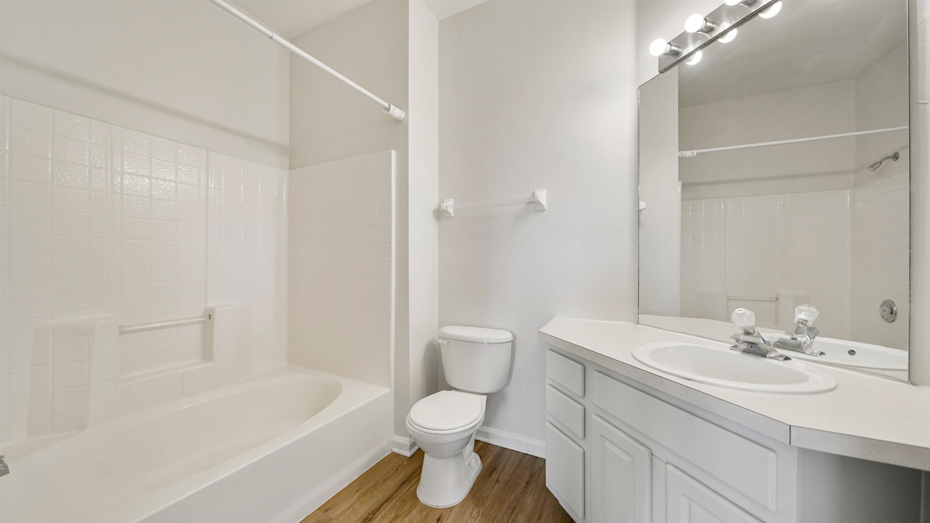 7990 Baymeadows Road, Unit 1114 Jacksonville, FL 32256 - Photo 12 of 30 a bathroom with a sink a toilet and shower