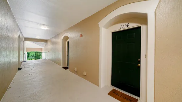 a view of a livingroom with a staircase