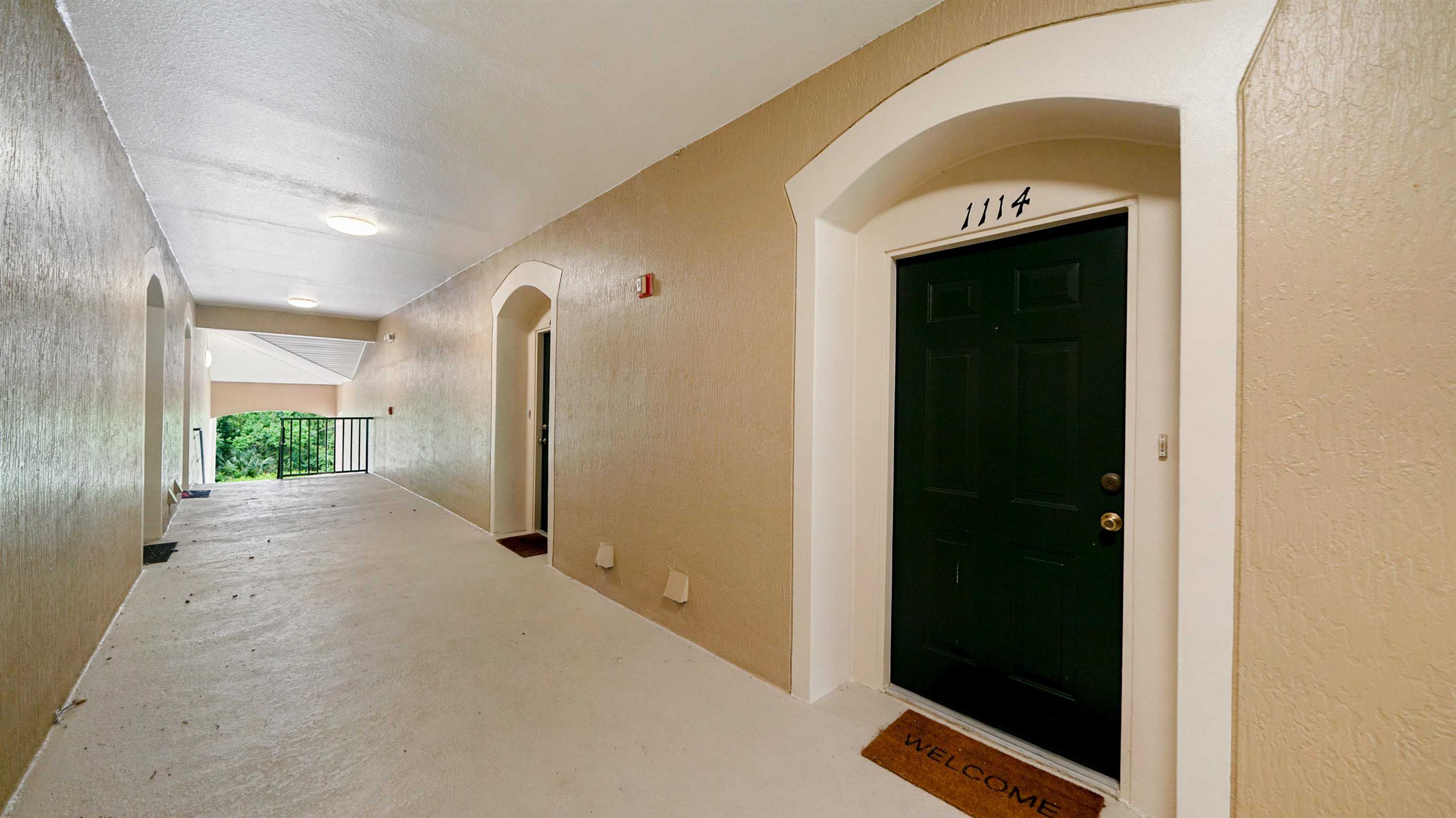 7990 Baymeadows Road, Unit 1114 Jacksonville, FL 32256 - Photo 2 of 30 a view of a livingroom with a staircase