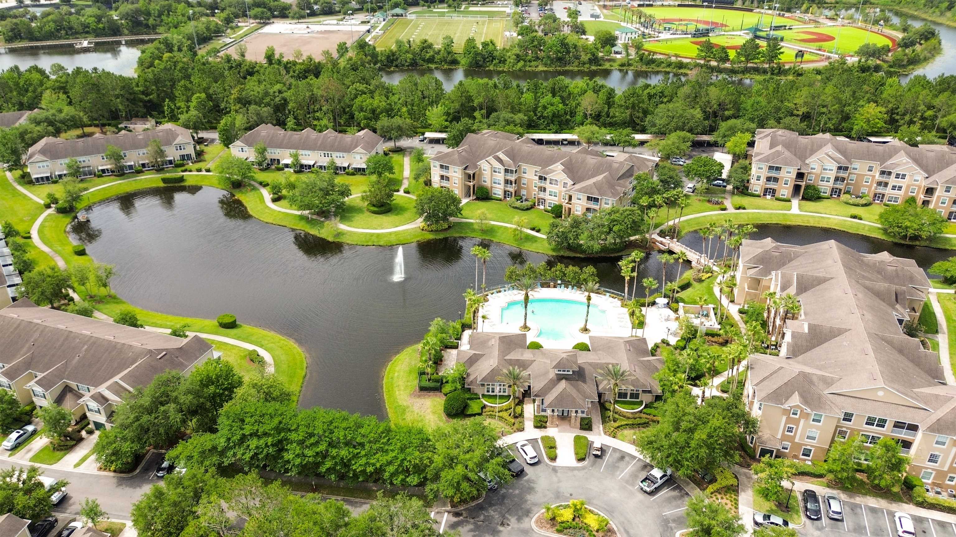 7990 Baymeadows Road, Unit 1114 Jacksonville, FL 32256 - Photo 24 of 30 an aerial view of residential house with outdoor space and swimming pool