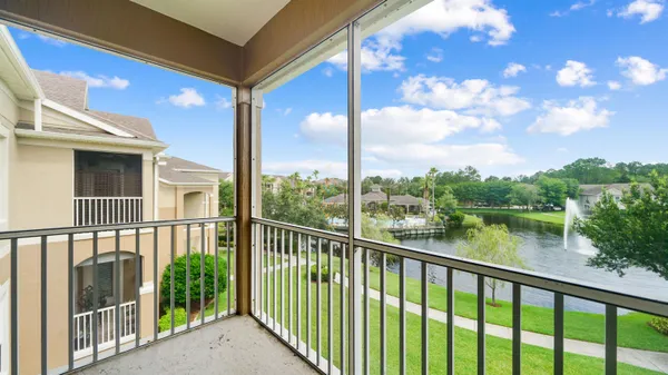 a view of a lake from a balcony