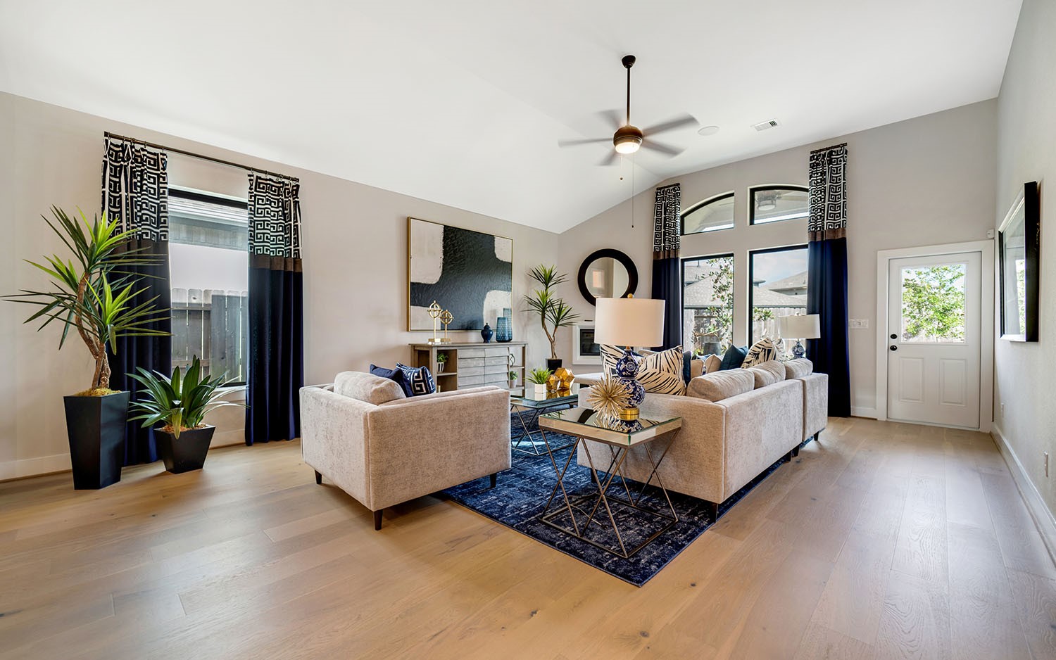 3610 Compass Pointe Court Angleton, TX 77515 - Photo 13 of 27 a living room with furniture and a large window