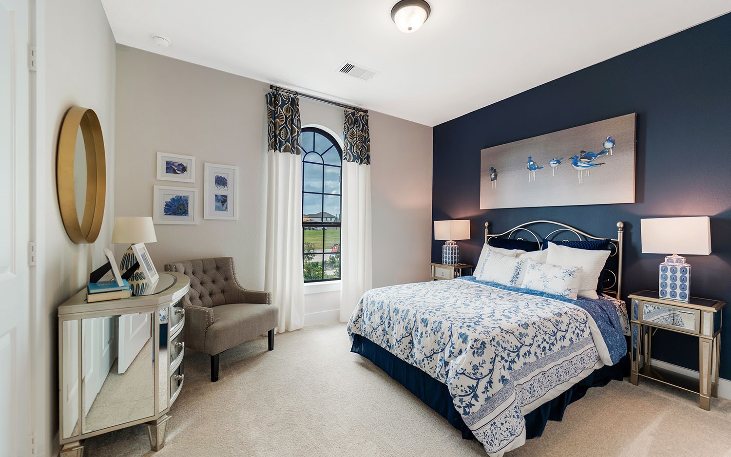 3610 Compass Pointe Court Angleton, TX 77515 - Photo 20 of 27 a bedroom with a large bed couch and a window