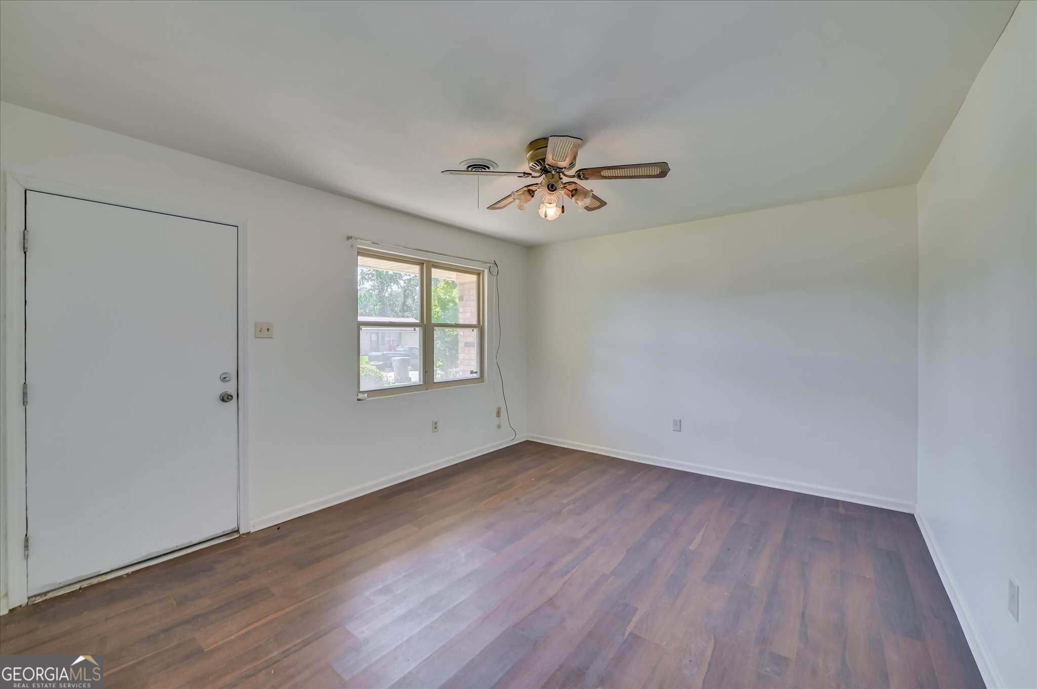 3621 Columbine Drive Augusta, GA 30906 - Photo 6 of 25 wooden floor in an empty room with a window