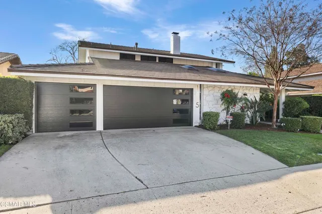 front view of house with a yard