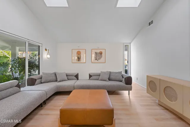 a living room with furniture and a couch