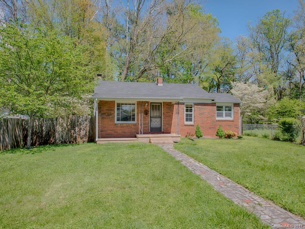 277 Chelsea Road Waynesville, NC 28786 - Photo 1 of 18 front view of a house with a garden