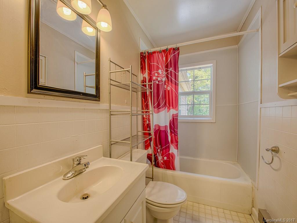277 Chelsea Road Waynesville, NC 28786 - Photo 18 of 18 a bathroom with a sink toilet and shower