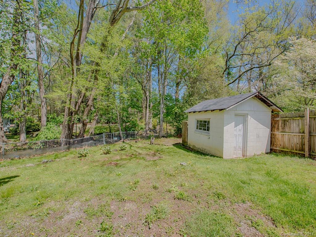 277 Chelsea Road Waynesville, NC 28786 - Photo 4 of 18 a view of a house with large trees