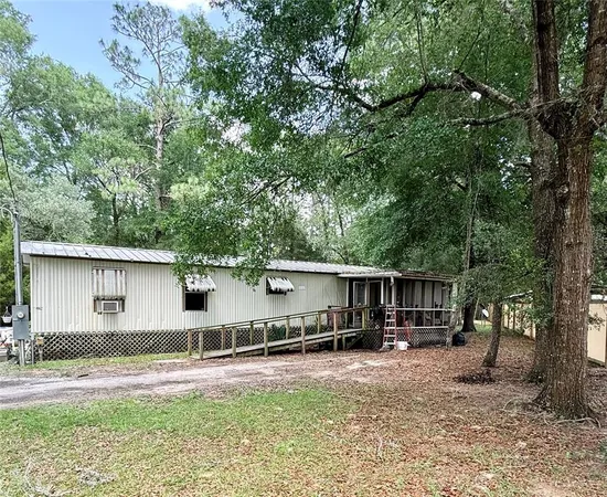 front view of a house with a patio