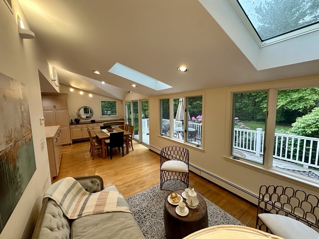 7 Todd Road Lexington, MA 02420 - Photo 6 of 17 a living room with furniture kitchen view and a large window
