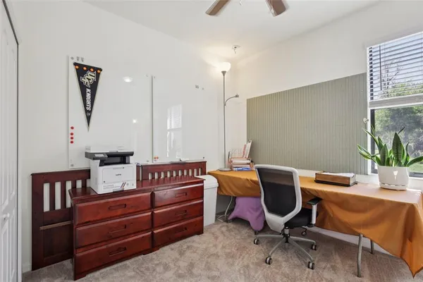 a view of a workspace with furniture