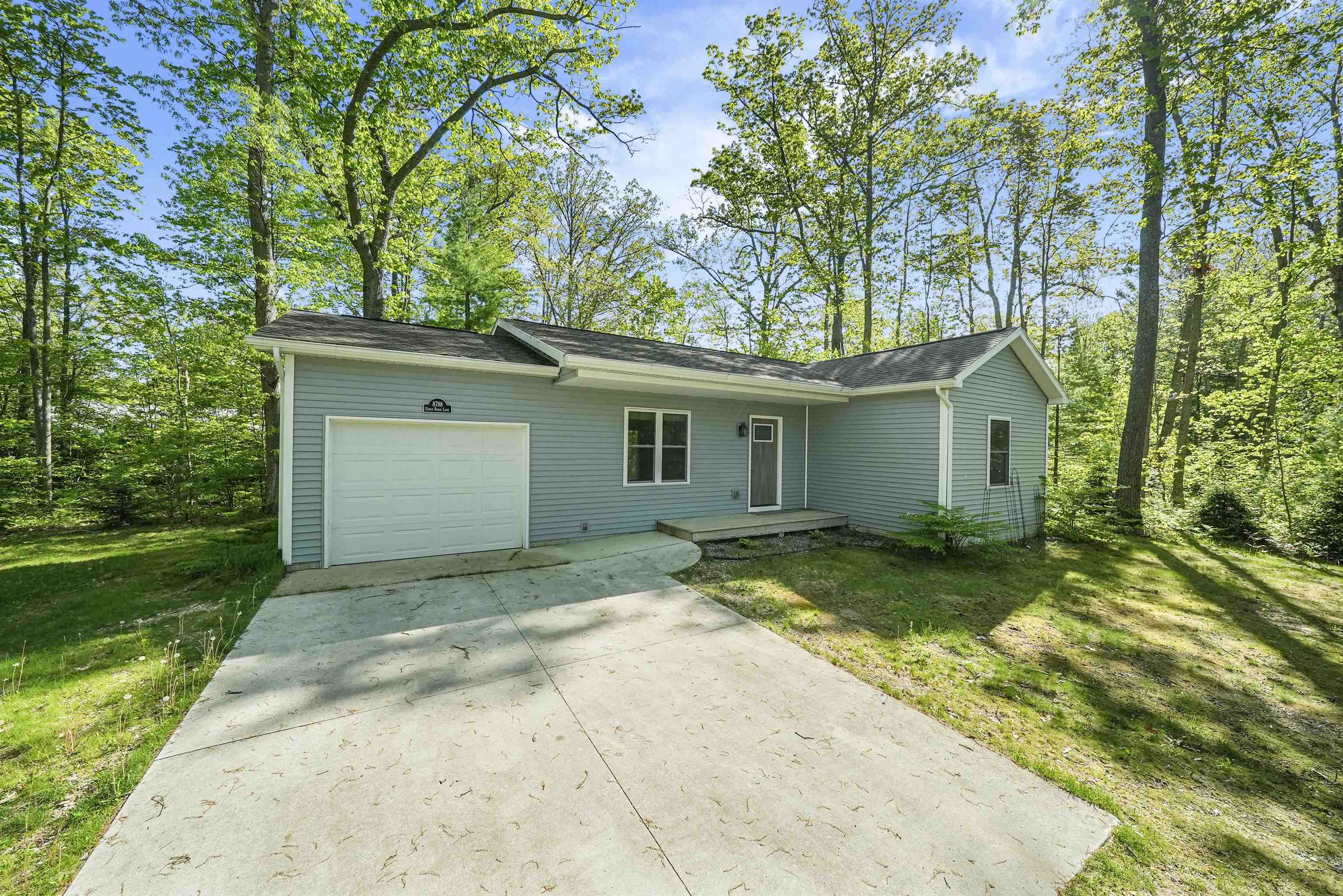 8788 Cedar Ridge Lane Fife Lake, MI 49633 - Photo 1 of 43