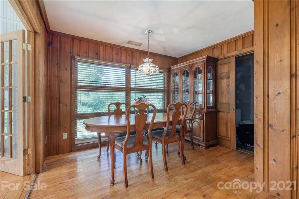 13914 Point Lookout Road Charlotte, NC 28278 - Photo 21 of 41 a view of a dining room with furniture window and outside view