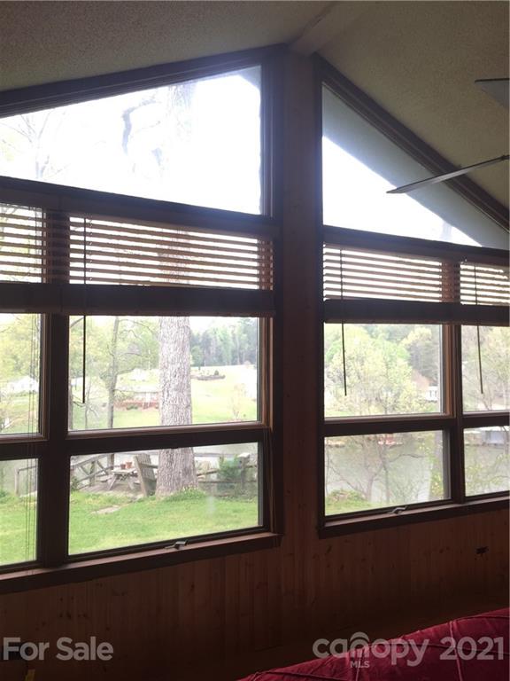 13914 Point Lookout Road Charlotte, NC 28278 - Photo 4 of 41 a view of an empty room with a window