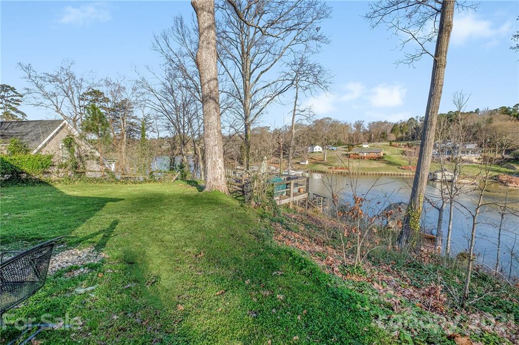 13914 Point Lookout Road Charlotte, NC 28278 - Photo 32 of 41 a view of a garden with a lake view