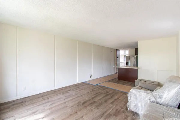 a living room with furniture and window