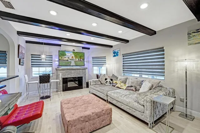 a bedroom with furniture and windows