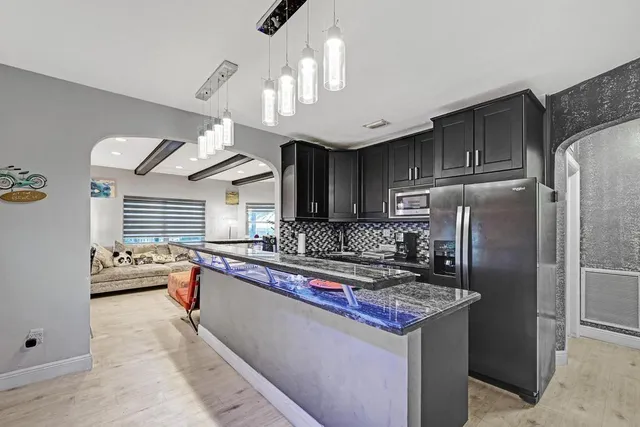 a room with furniture and screen