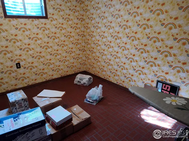a view of a hallway with seating area