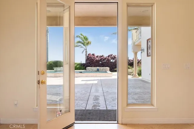 a view of a lake with beach and city view