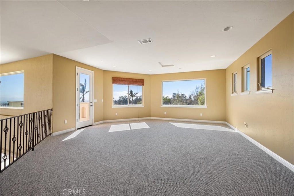 1685 Scenic View Way Nipomo, CA 93444 - Photo 13 of 64 a view of an empty room with a window and a fireplace