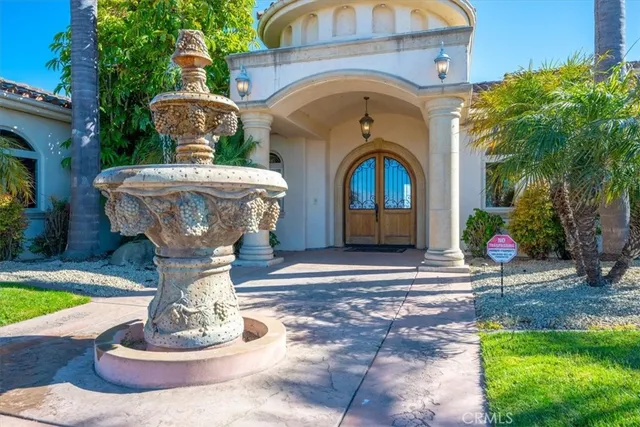 a front view of a house with sitting space
