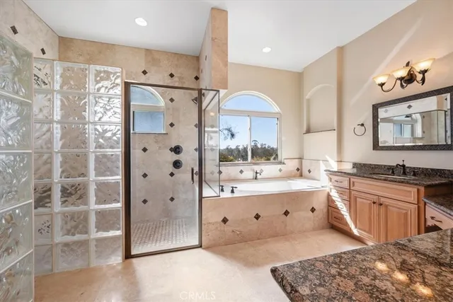 a kitchen with stainless steel appliances granite countertop a stove and a sink