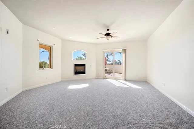 a kitchen with stainless steel appliances granite countertop a stove and a refrigerator