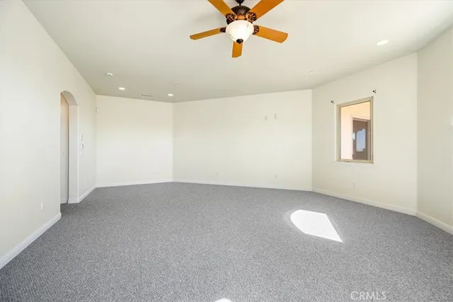 a house with palm tree in front of it