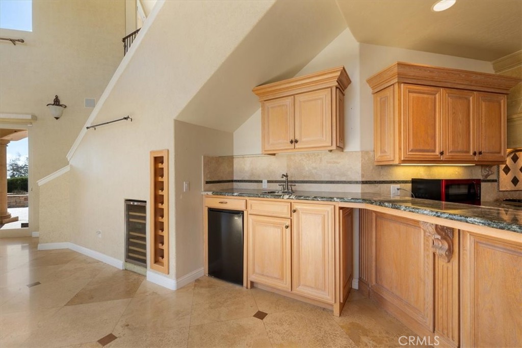 1685 Scenic View Way Nipomo, CA 93444 - Photo 48 of 64 a kitchen with stainless steel appliances granite countertop a stove a sink and a refrigerator