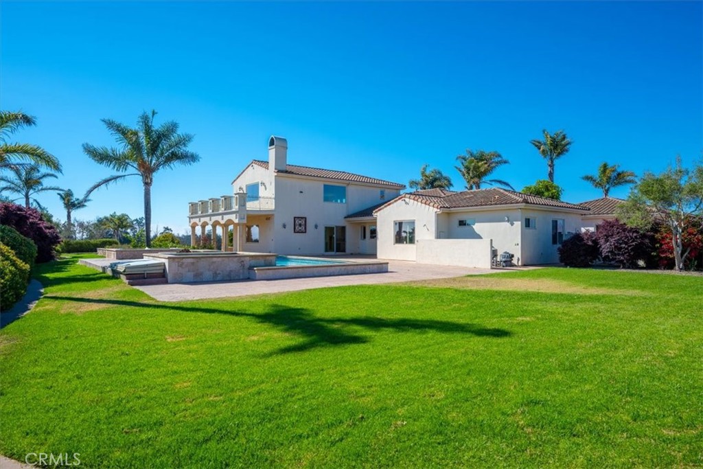 1685 Scenic View Way Nipomo, CA 93444 - Photo 5 of 64 a front view of a house with garden