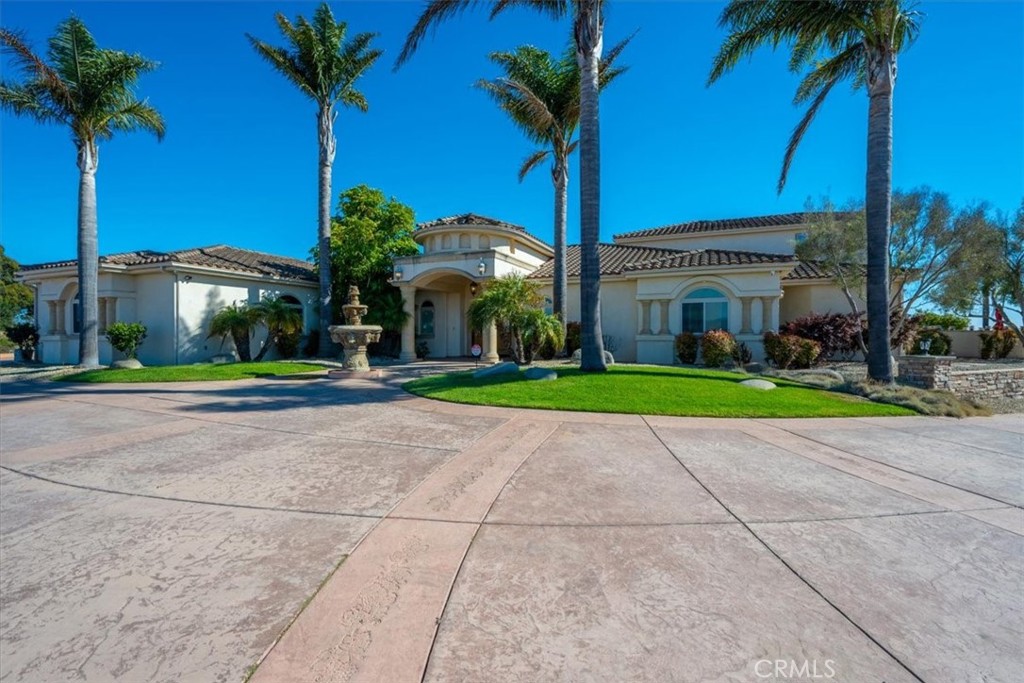 1685 Scenic View Way Nipomo, CA 93444 - Photo 54 of 64 a house with palm tree in front of it