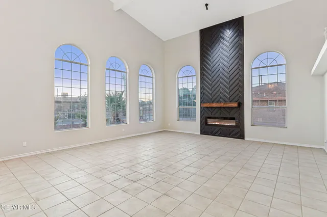 an empty room with windows