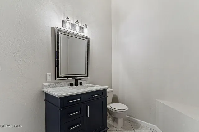 a bathroom with a sink and a toilet