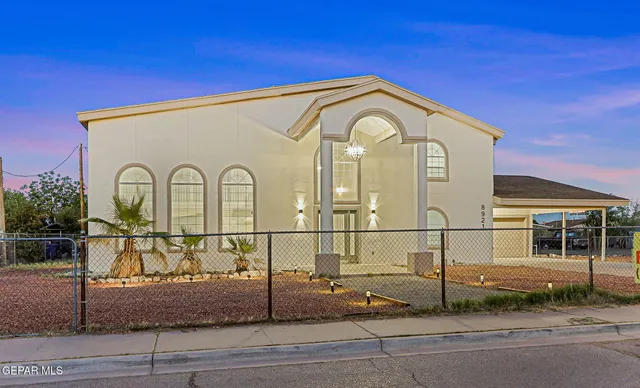 a view of a back yard of the house