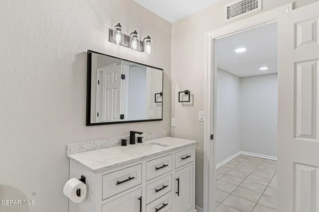 a view of a hallway with windows