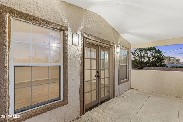 a view of a big house with a big yard