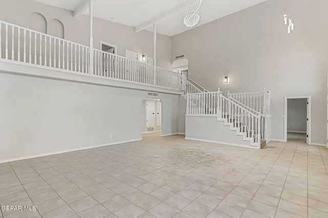 a view of a hallway with staircase