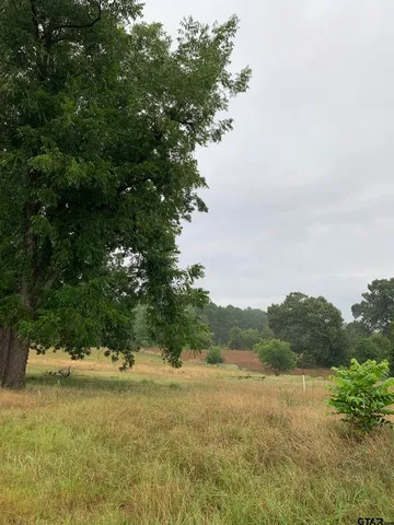 a view of mountain with lake view