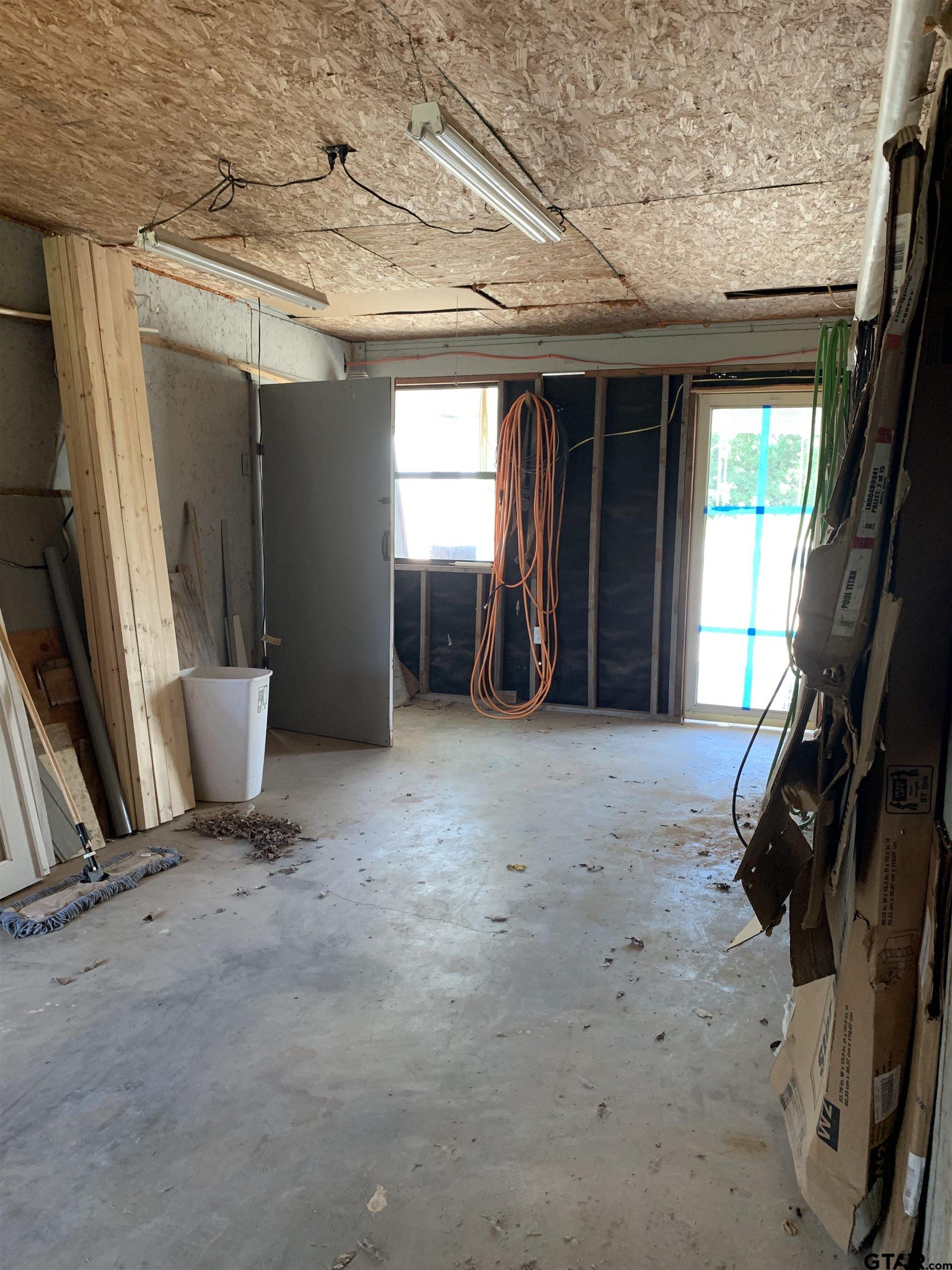 502 County Road 3264 Quitman, TX 75783 - Photo 16 of 37 a view of a room with gym equipment