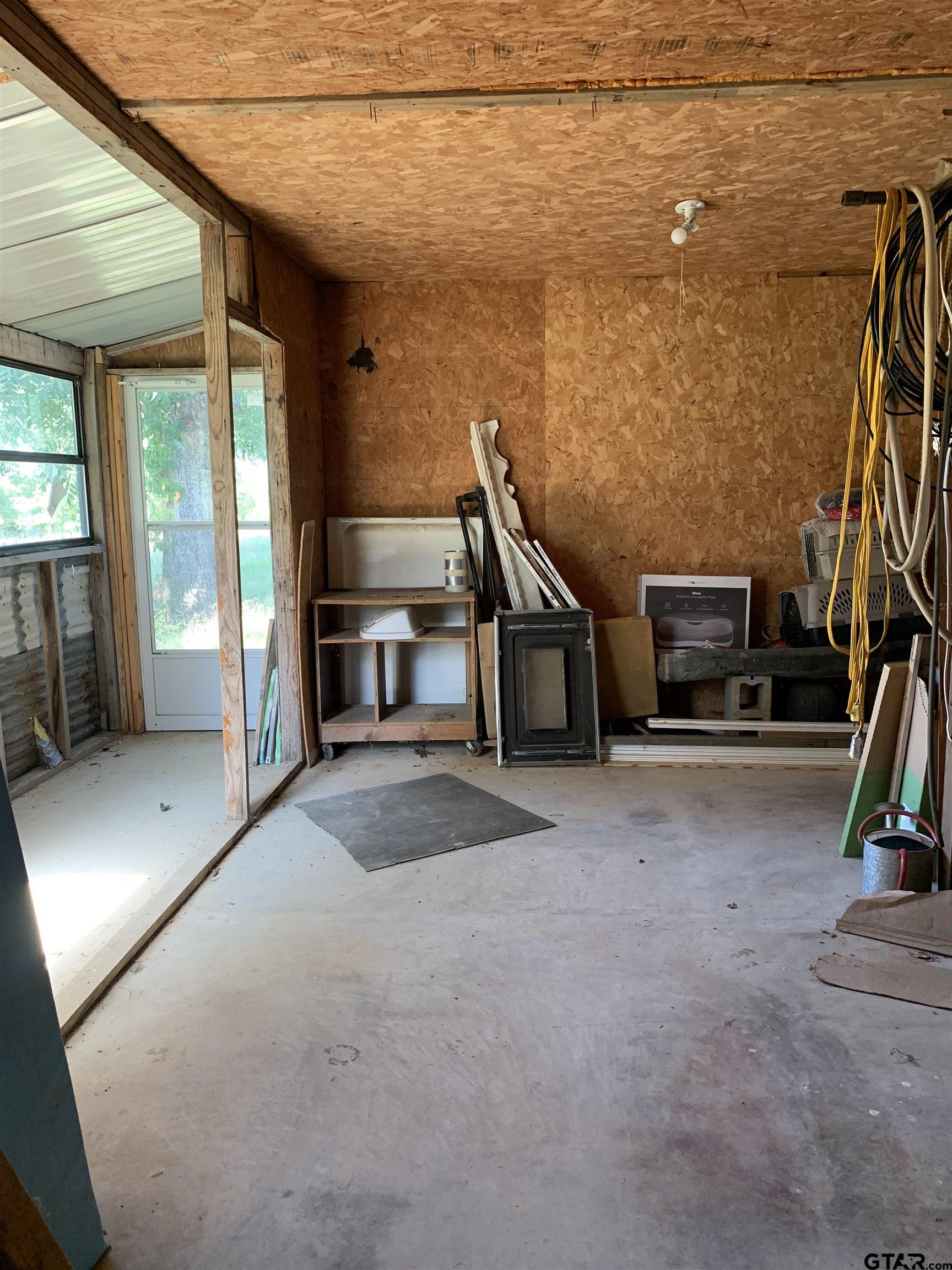 502 County Road 3264 Quitman, TX 75783 - Photo 17 of 37 a view of a livingroom with furniture and staircase