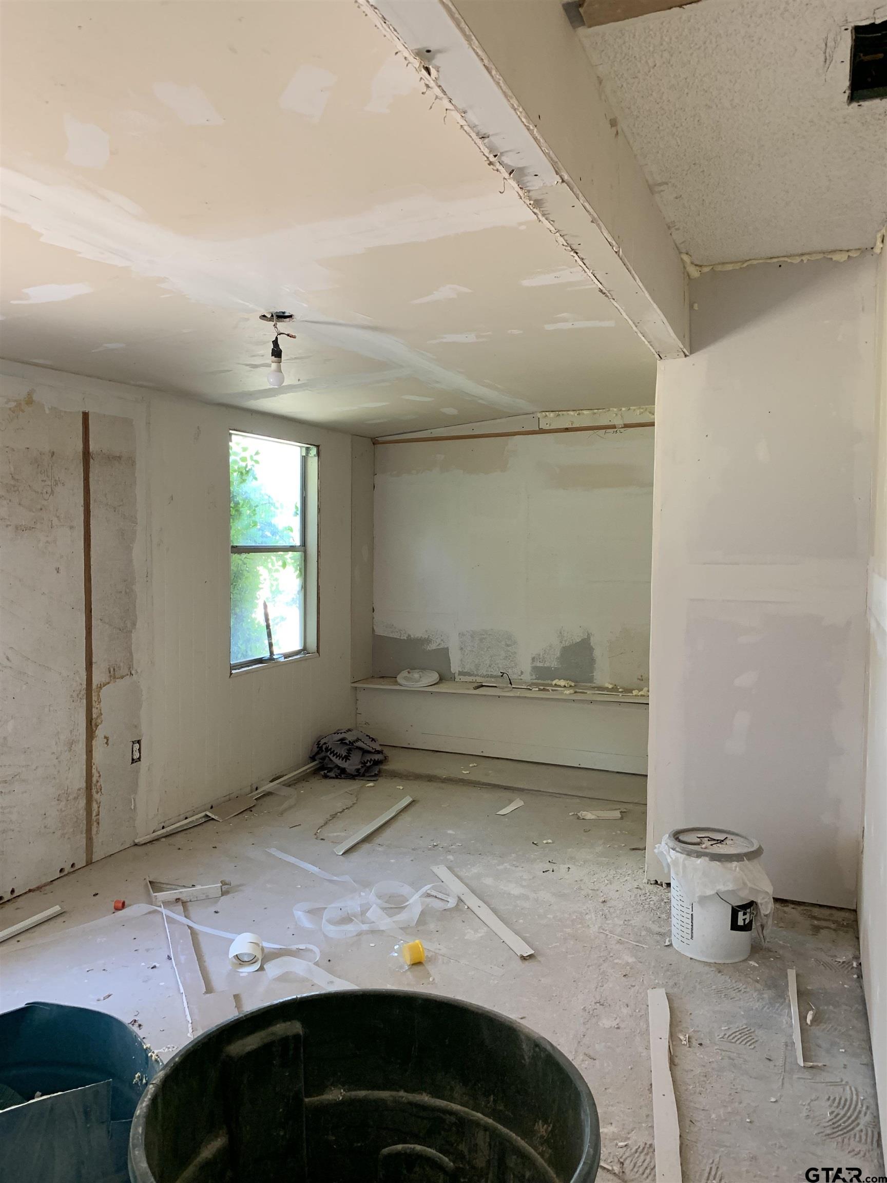 502 County Road 3264 Quitman, TX 75783 - Photo 28 of 37 a bedroom with a bed and a window