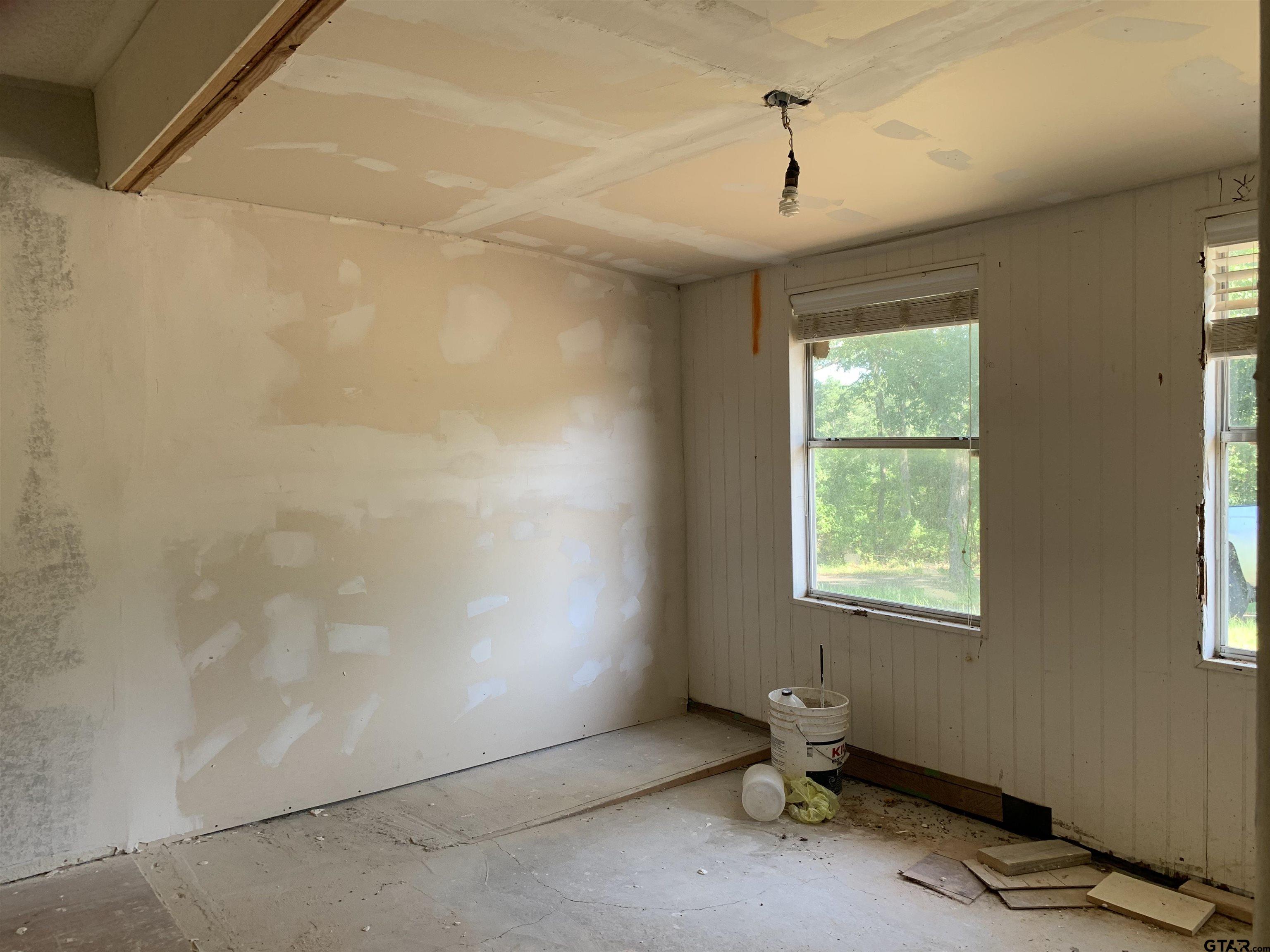 502 County Road 3264 Quitman, TX 75783 - Photo 29 of 37 a room with gym equipment and a window