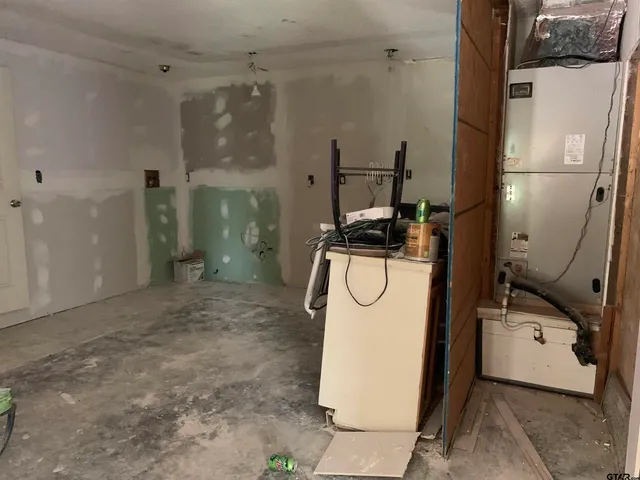 a room with lots of storage and utility